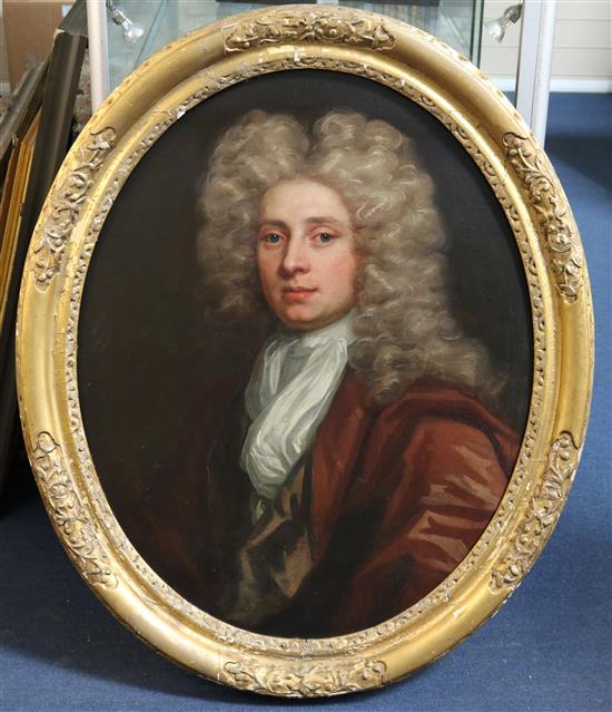 Follower of Charles Jervas, oil, head and shoulder portrait of a young gentleman (Palmes family)